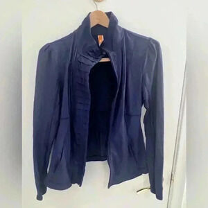 Lucy Activewear Top Size S. Peplum detailing. Thumb holes. Good Pre-owned cond